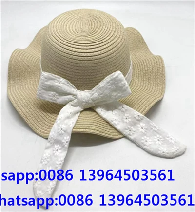 Topi Pantai Motif Pita Wanita dari Jerami